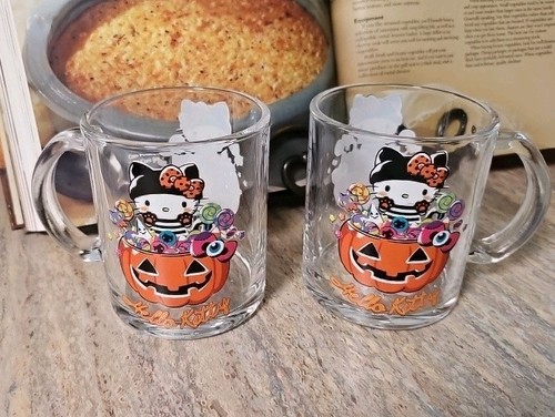 Two hello kitty witch - two,