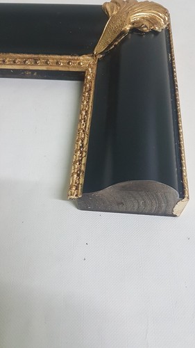 Cornice legno oro nera - in,