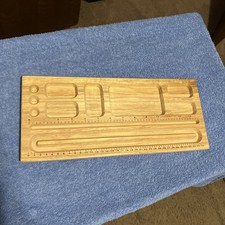 Tavola di perline in legno per