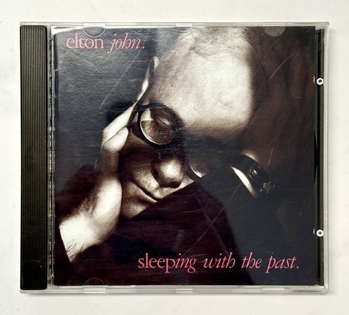 Elton john sleeping with - -,