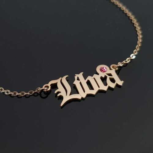 Collana bilancia con - con, pietra
