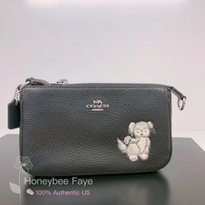 Coach Nolita 19 con cane