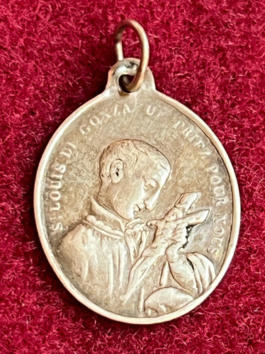 Antico ciondolo religioso