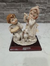 Statuina Capodimonte G.Armani