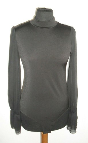 Particolare maglia blusa a - e,