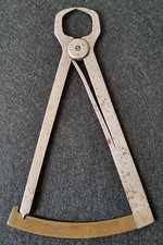 Misuratore decimi a molla per