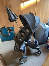 Passeggino Xplory by Stokke completo di ovetto IziGo e supporto per auto. Nuovo