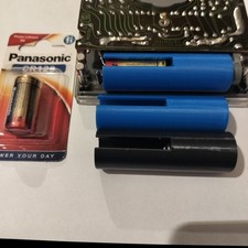 Nuovo adattatore più una pila