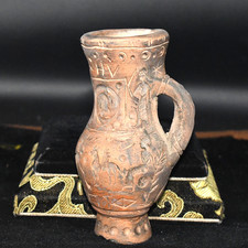 Antica brocca in terracotta