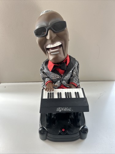 Statuina che canta ray - che,