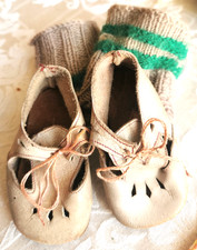 Antiche scarpe per bambole in