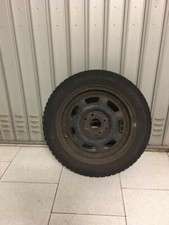 cerchi in ferro con  pneumatici Bridgestone 185/55 R14 montati
