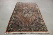 Antico tappeto persiano bidjar