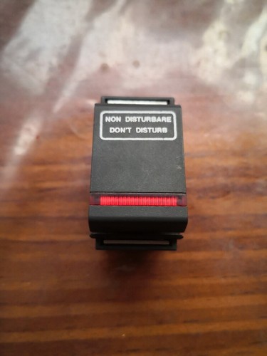 Pulsante luminoso con - , scritta