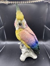 Antica statuina pappagallo