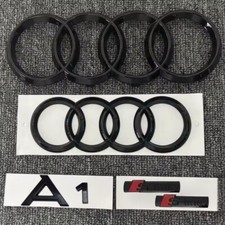 KIT COMPLETO LOGHI AUDI A1 NERO LUCIDO - fregi anteriore posteriore targhette A1