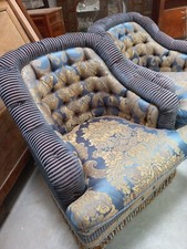 Coppia di poltrone capitone' di grande arredo