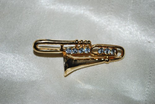 Spilla trombone diapositiva