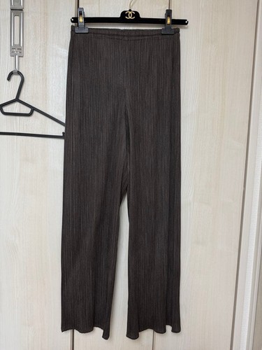 Pantaloni larghi con pieghe