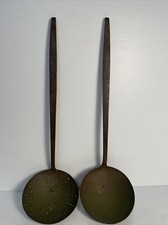 Antico colino antico e mestolo