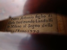 Vecchio violino con attuale P
