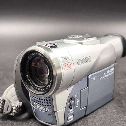 Canon mvx200 video camera - e,