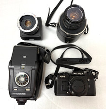 Fotocamera reflex Fujica AX 3 con obiettivo 50 mm, 2x teleconvertitore, flash e borsa NON TESTATA