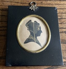 Antico ritratto sagoma dorata