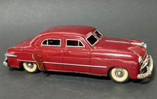 Vecchio giocattolo di latta SG