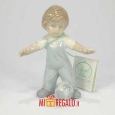 HERVIT BAMBINO IN PORCELLANA