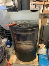 Multifire Palazzetti  a legna pellet vetro tondo canalizzabile con Rivestimento