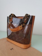 Louis Vuitton. Borsa CABAS Monogram chiare in vinile ambrè.