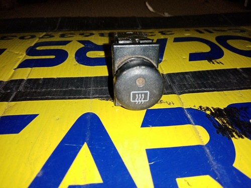 Rear window defrost button - rear,