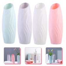  4 vasi alti con boccioli