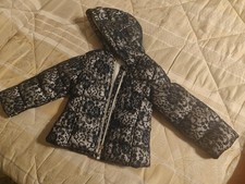 Piumino ricamato marca