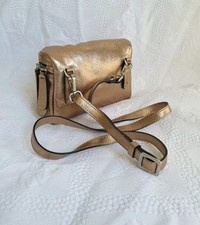 Borsa donna Gianni Chiarini Firenze in pelle tono oro stile marsupio tracolla cintura.