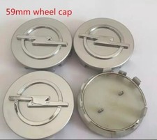  TAPPI COPRIMOZZO OPEL corsa astra tigra agila adam mokka 58 MM GRIGIO SILVER