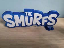 Puffi The Smurfs Logo 3D Blu Bianco  Collezione 16x5cm Espositore