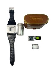 Cinturino orologio pelle Tessina, pellicola latta, cassa, lente concava, filtro, mirino 