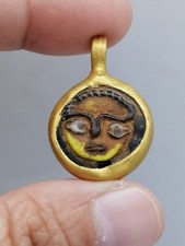 Ancient Roman face glass