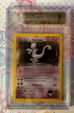 Rocket’s Mewtwo 14/132 holo ??                Gym Challenge  Pokemon Beckett 9
