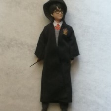 Action figure Harry Potter alto 24 cm completo di vestito e bacchetta 