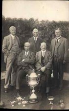 Trofeo uomini e palline prato