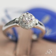 Anello solitario Damiani oro