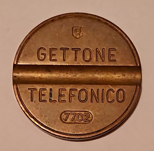 Gettone telefonico 7702 - gettone,