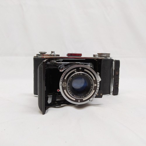 Macchina fotografica - , a
