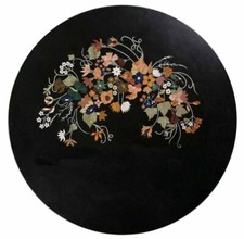 Tavolo rotondo in marmo nero