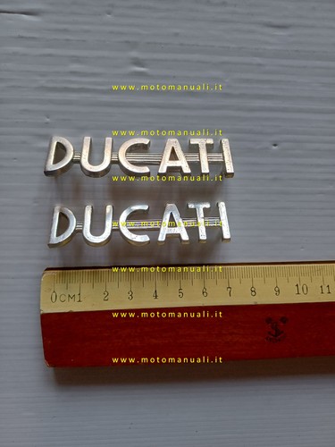 Ducati coppia fregi - , metallo