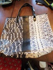 Borsa Coach nera bianca stile