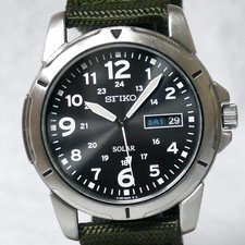 Orologio da campo militare SEIKO V158 2014 nero energia solare giorno-data luminoso Giappone